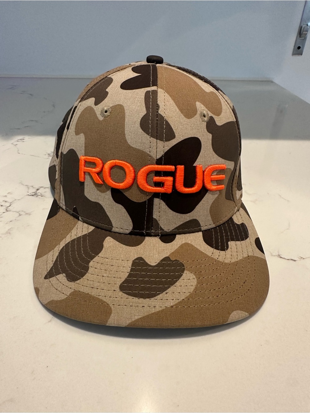 Rogue Camo Hat with Bright Orange Logo